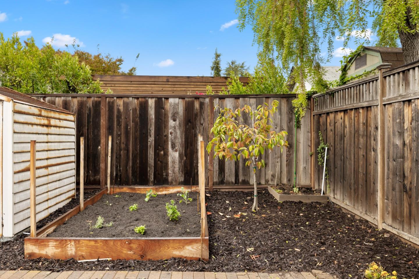 220 Channing Road Burlingame, CA 94010 - Photo 56 of 60 a view of a pathway of a house with a yard