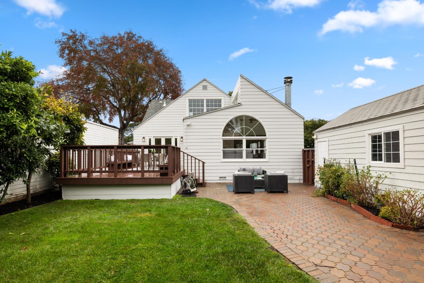 220 Channing Road Burlingame, CA 94010 - Photo 58 of 60 a view of a house with a yard and furniture