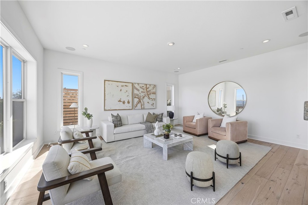 20138 Marlow Lane Porter Ranch, CA 91326 - Photo 10 of 39 a living room with furniture a window and a table