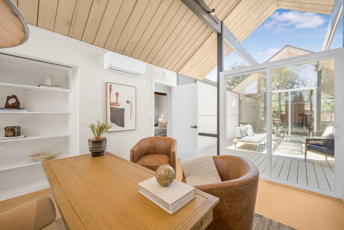 1111 East Homestead Road Sunnyvale, CA 94087 - Photo 13 of 25 a living room with furniture and a large window