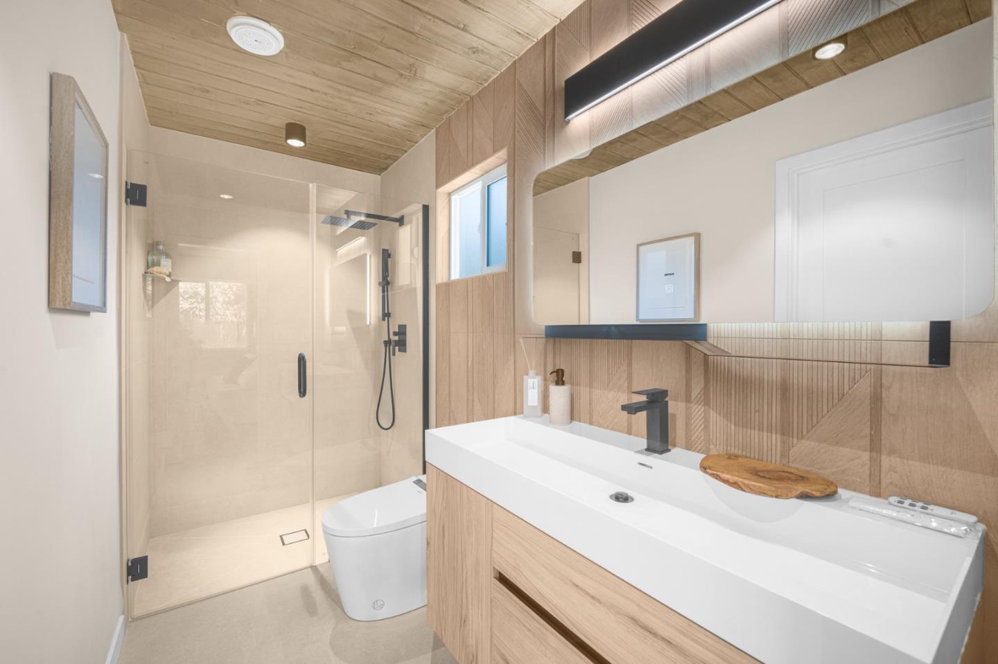 1111 East Homestead Road Sunnyvale, CA 94087 - Photo 17 of 25 a bathroom with a sink a toilet and shower