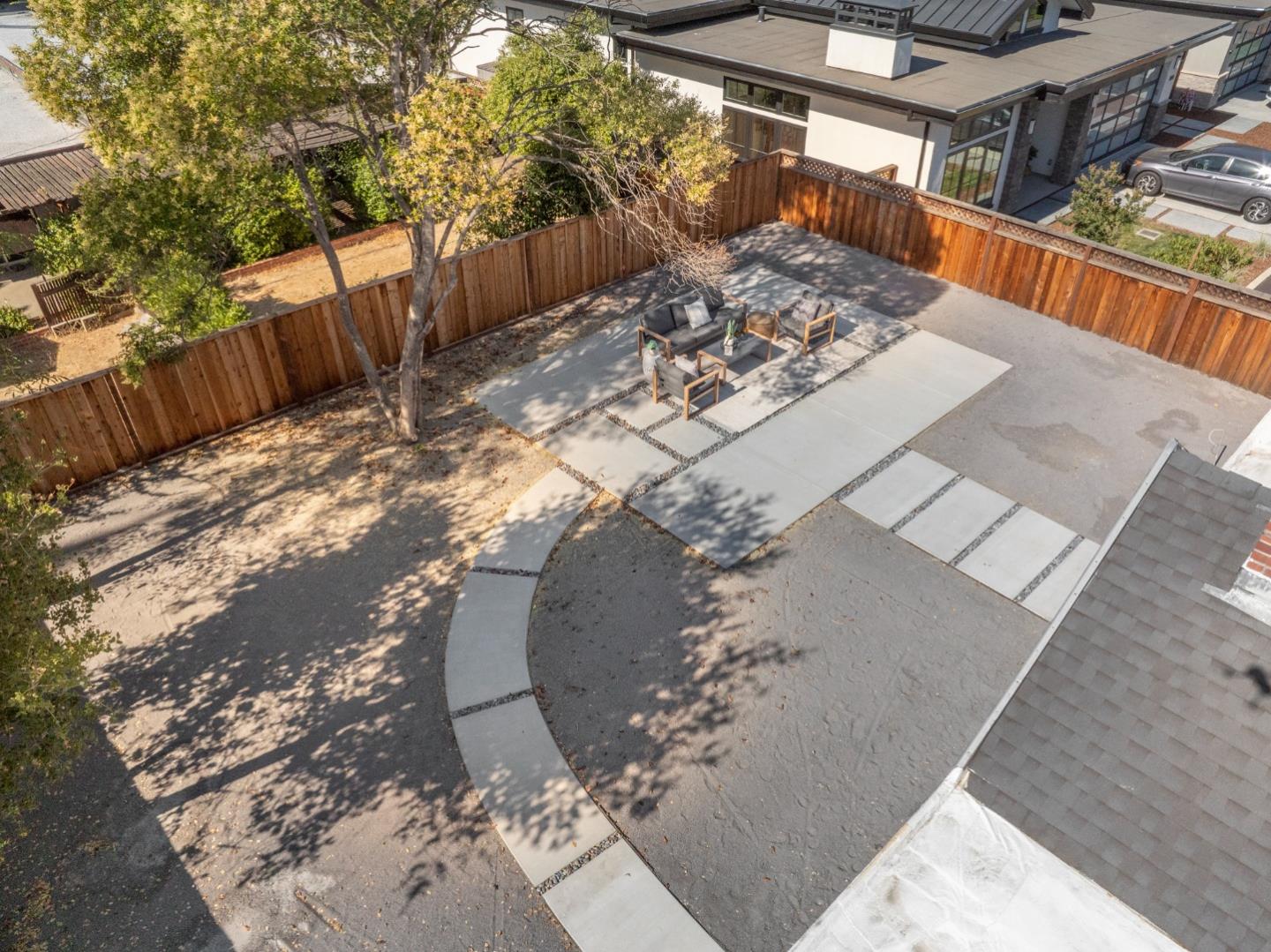 1111 East Homestead Road Sunnyvale, CA 94087 - Photo 19 of 25 a view of a backyard with wooden fence