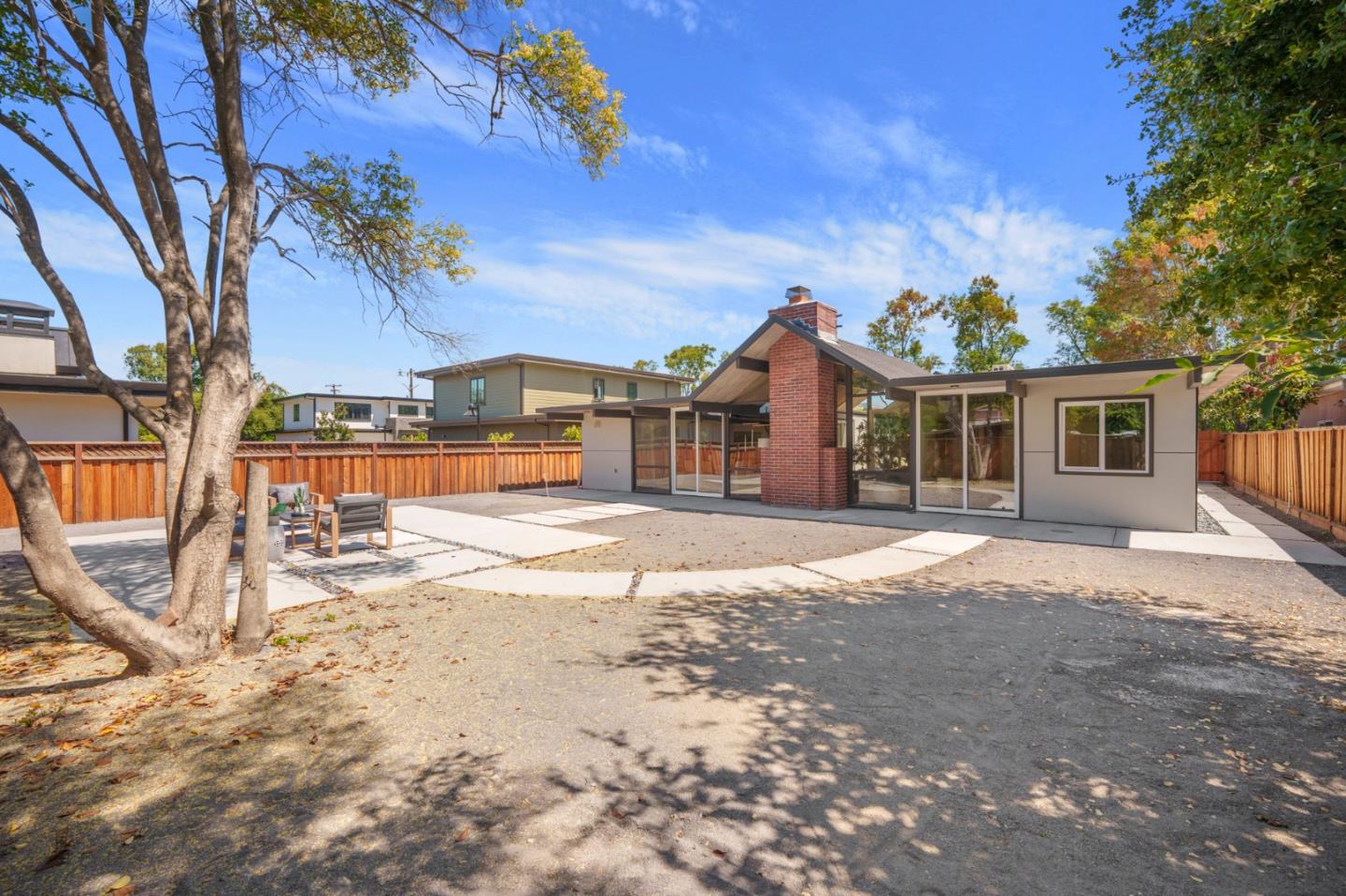 1111 East Homestead Road Sunnyvale, CA 94087 - Photo 21 of 25 a view of a house with a snow on the yard