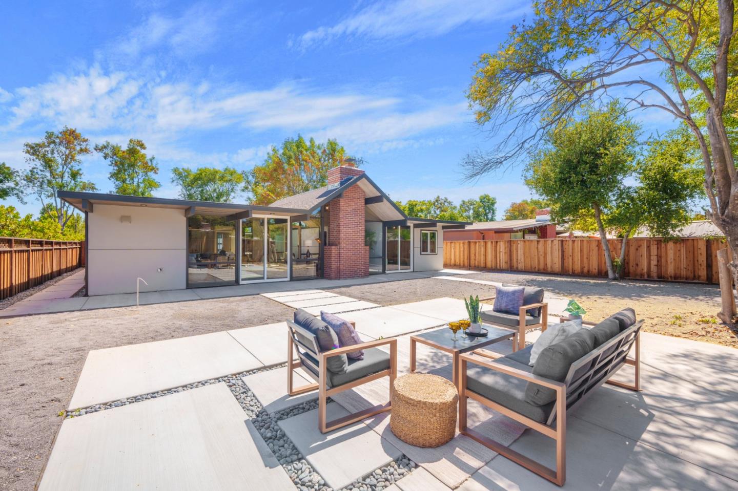 1111 East Homestead Road Sunnyvale, CA 94087 - Photo 22 of 25 a view of a patio with a table and chairs
