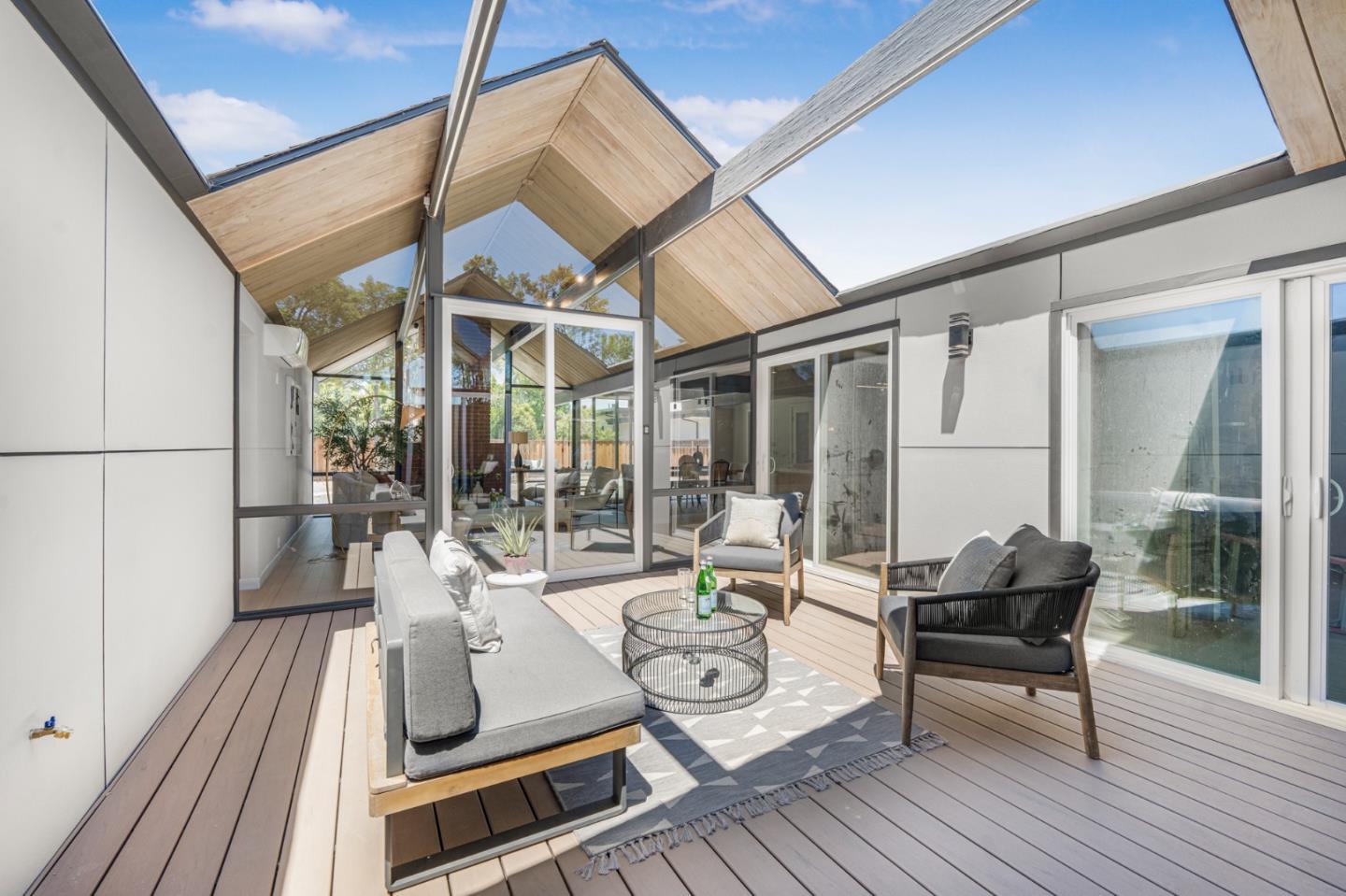 1111 East Homestead Road Sunnyvale, CA 94087 - Photo 10 of 25 a living room with furniture and a table