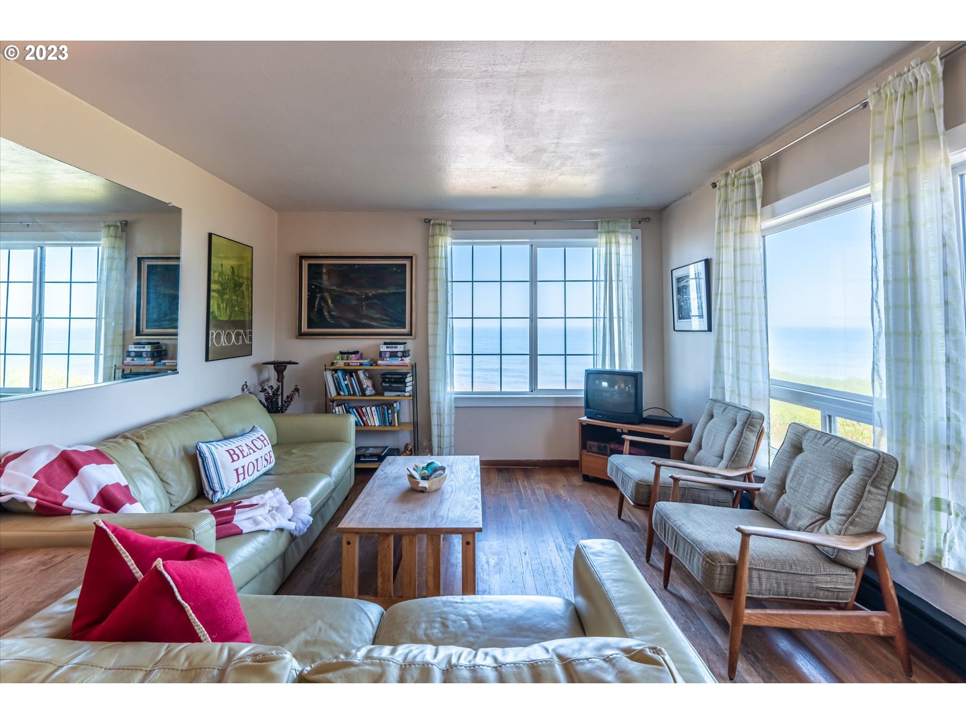33032 Nesika Road Gold Beach, OR 97444 - Photo 18 of 35 a living room with furniture rug and window