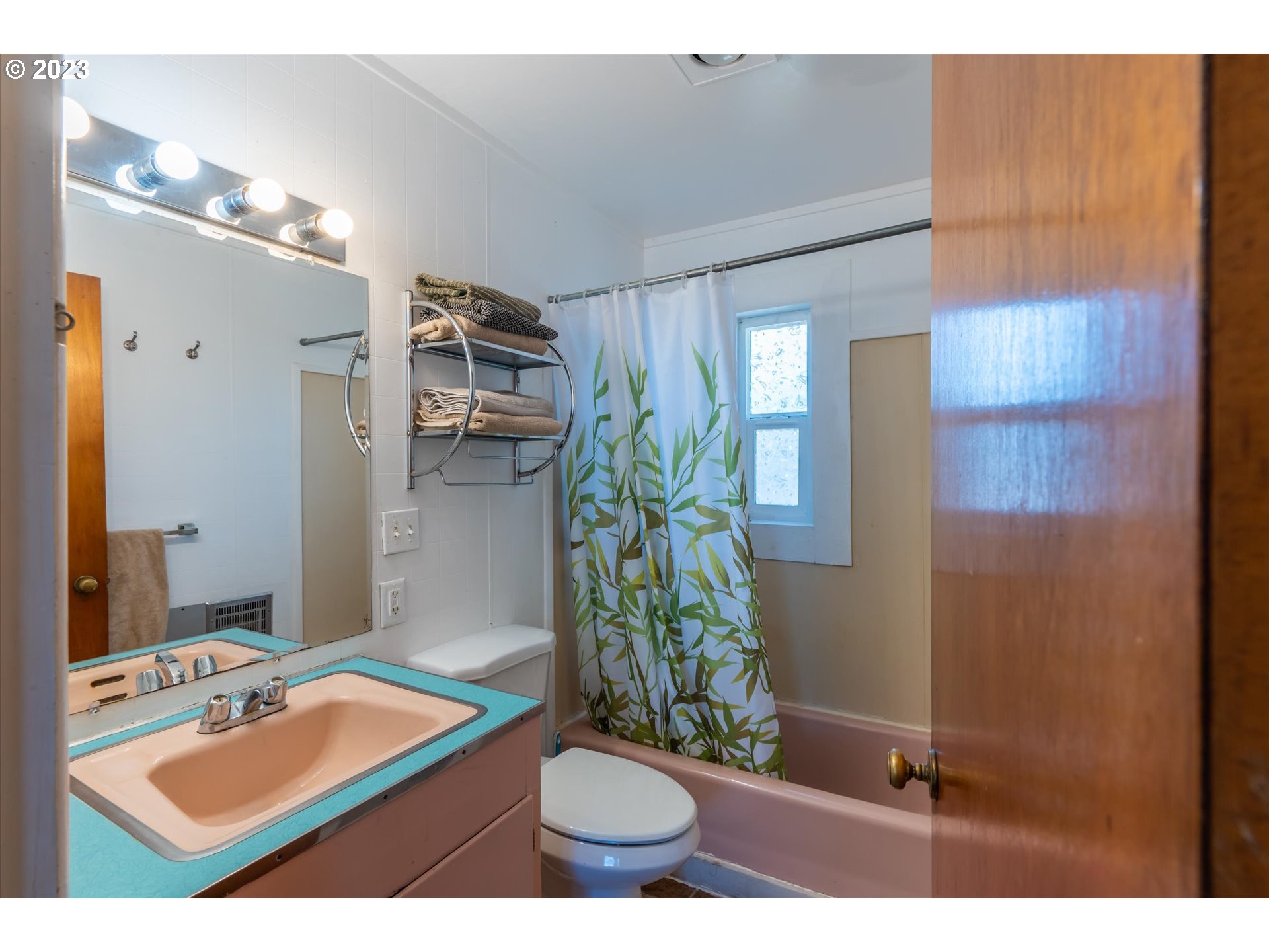 33032 Nesika Road Gold Beach, OR 97444 - Photo 24 of 35 a bathroom with a sink a toilet and shower