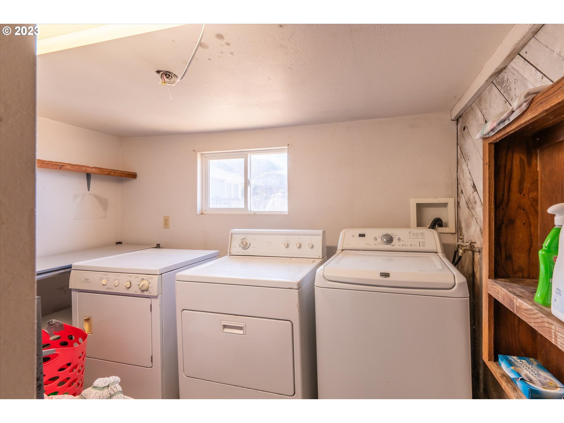 33032 Nesika Road Gold Beach, OR 97444 - Photo 27 of 35 a utility room with dryer and washer