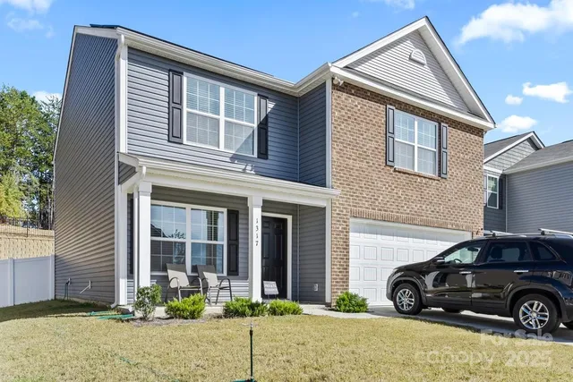 a car parked in front of a house