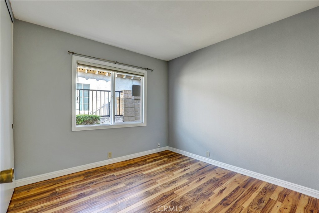 21822 Jinetes Mission Viejo, CA 92691 - Photo 12 of 33 a view of empty room with wooden floor