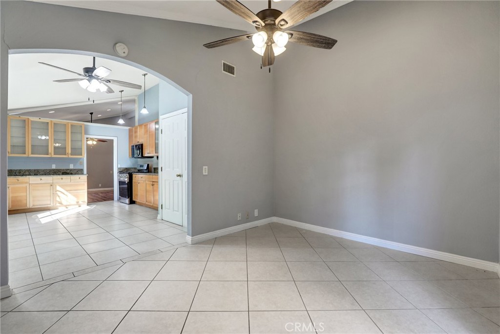 21822 Jinetes Mission Viejo, CA 92691 - Photo 24 of 33 wooden floor in an empty room and a kitchen