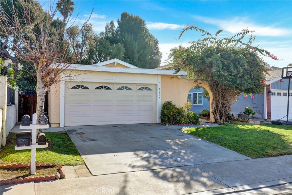 21822 Jinetes Mission Viejo, CA 92691 - Photo 32 of 33 a front view of a house with a yard