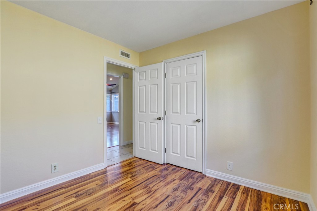 21822 Jinetes Mission Viejo, CA 92691 - Photo 10 of 33 a view of an empty room with wooden floor