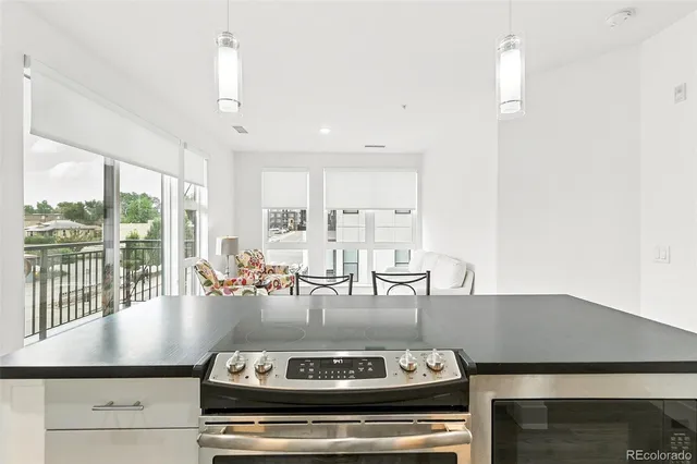 a kitchen with a stove and cabinets