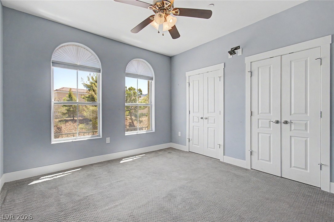 2555 Hampton Road, Unit 6308 Henderson, NV 89052 - Photo 12 of 30 Dual arched windows bring in the light to the second bedroom with its double closets.