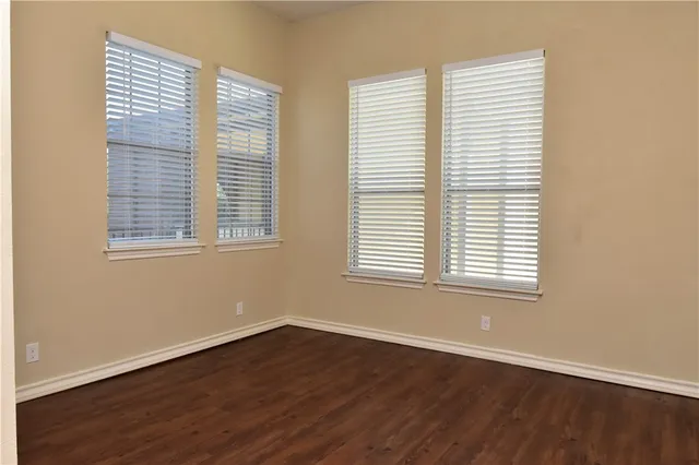 a view of a room that has a window in it