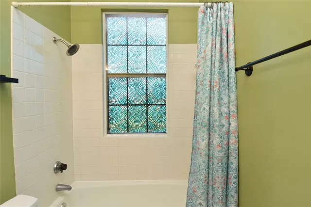 a view of a building with a bench