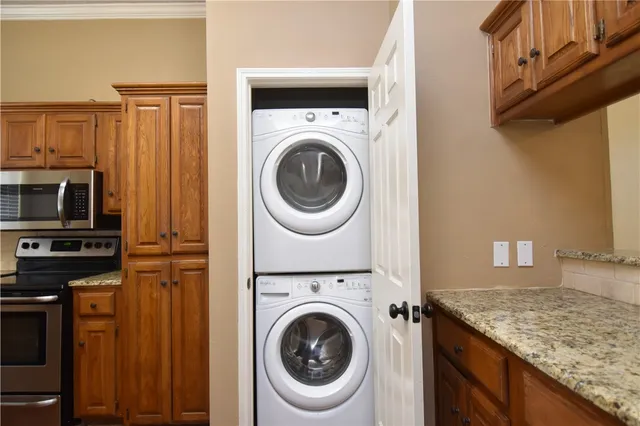 a view of a kitchen cabinets and wooden floor