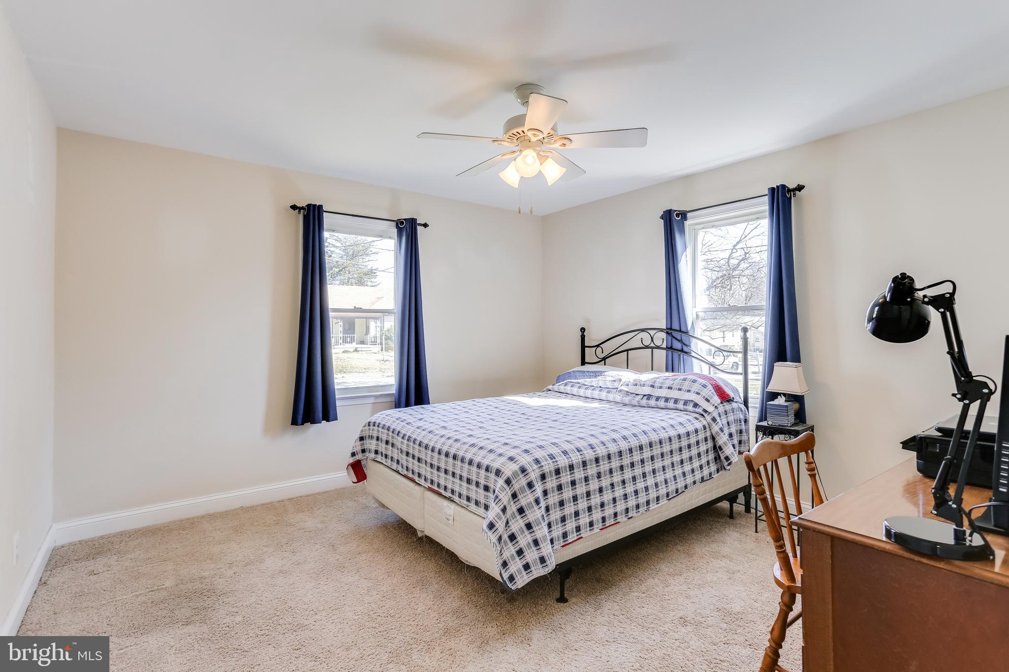 1809 Briarcliff Road Baltimore, MD 21234 - Photo 11 of 33 a bedroom with a bed and window