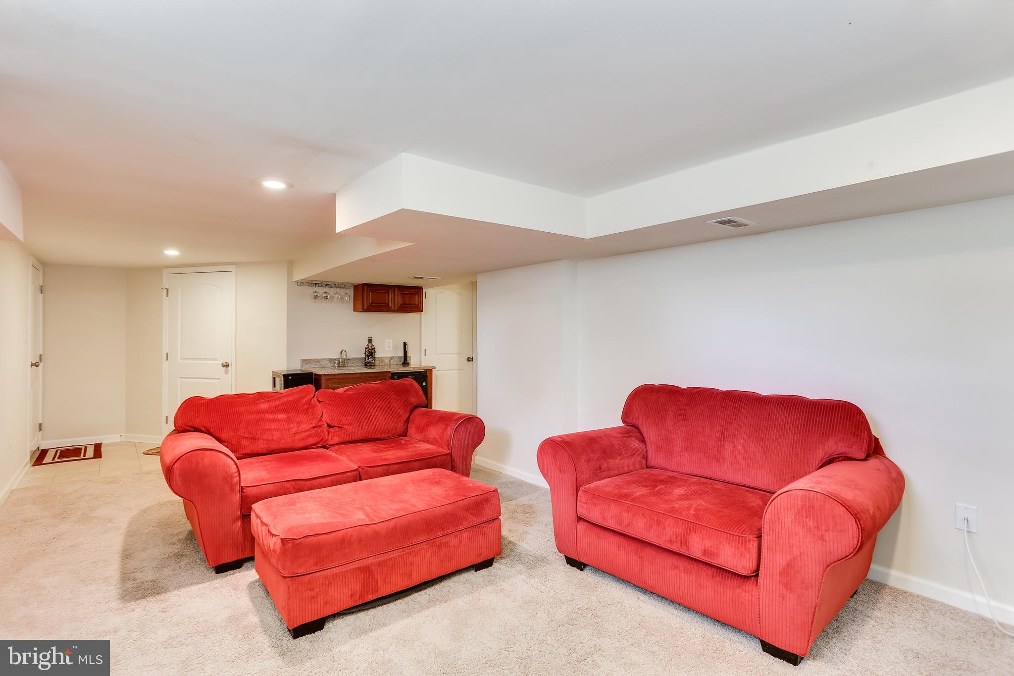 1809 Briarcliff Road Baltimore, MD 21234 - Photo 26 of 33 a living room with furniture and a couch