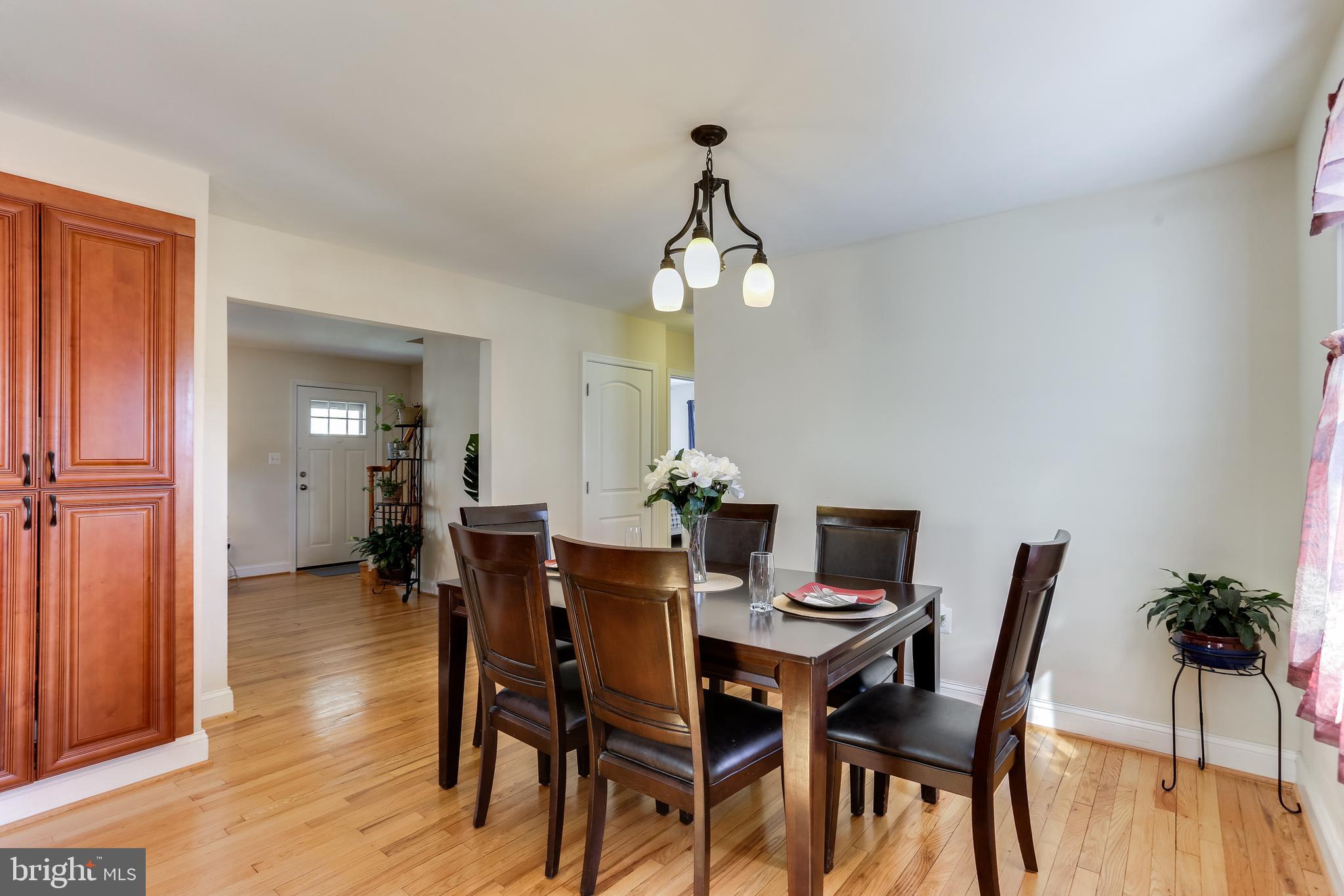 1809 Briarcliff Road Baltimore, MD 21234 - Photo 4 of 33 a view of a dining room with furniture and wooden floor