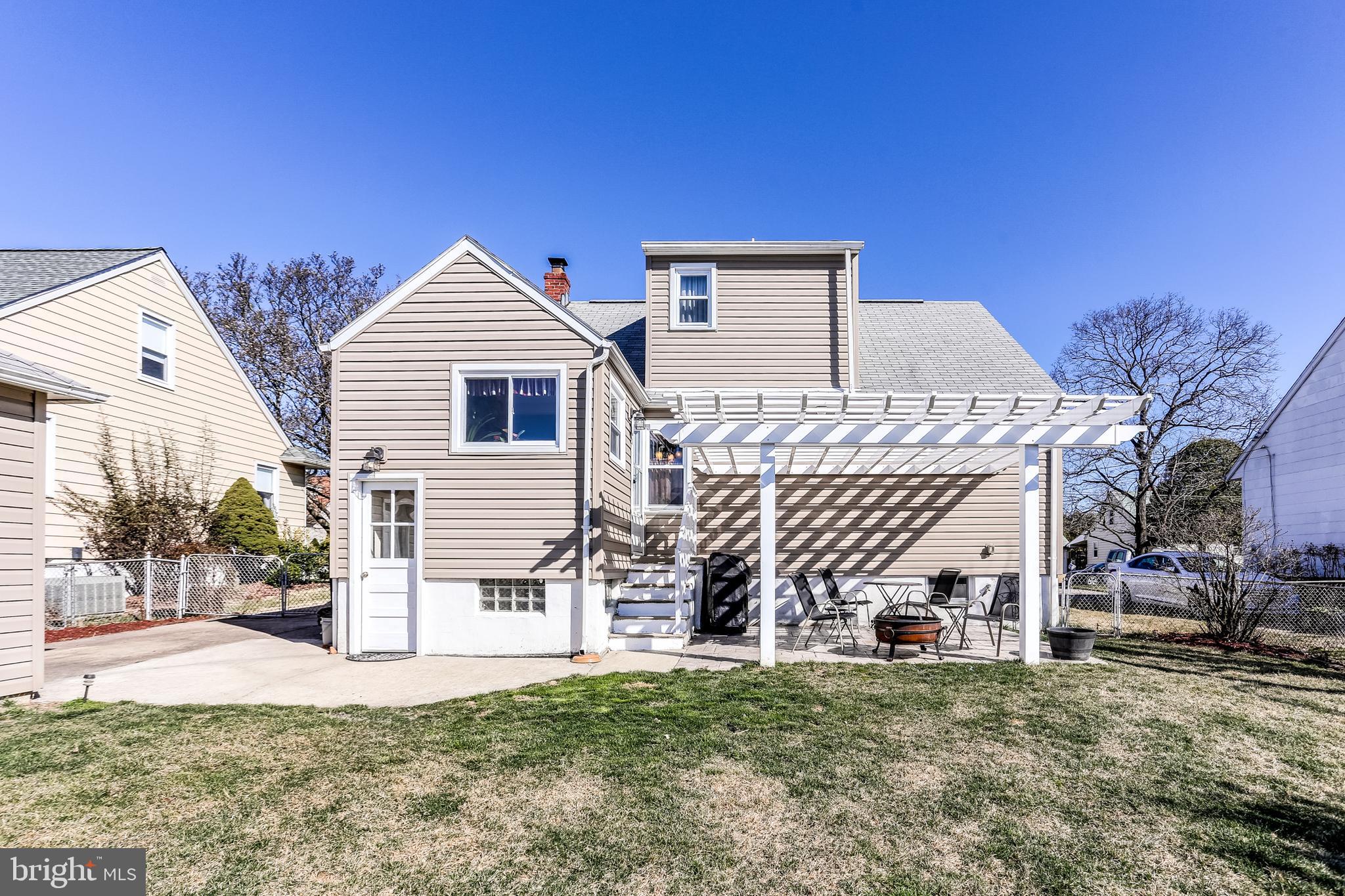 1809 Briarcliff Road Baltimore, MD 21234 - Photo 31 of 33 a front view of a house with a yard