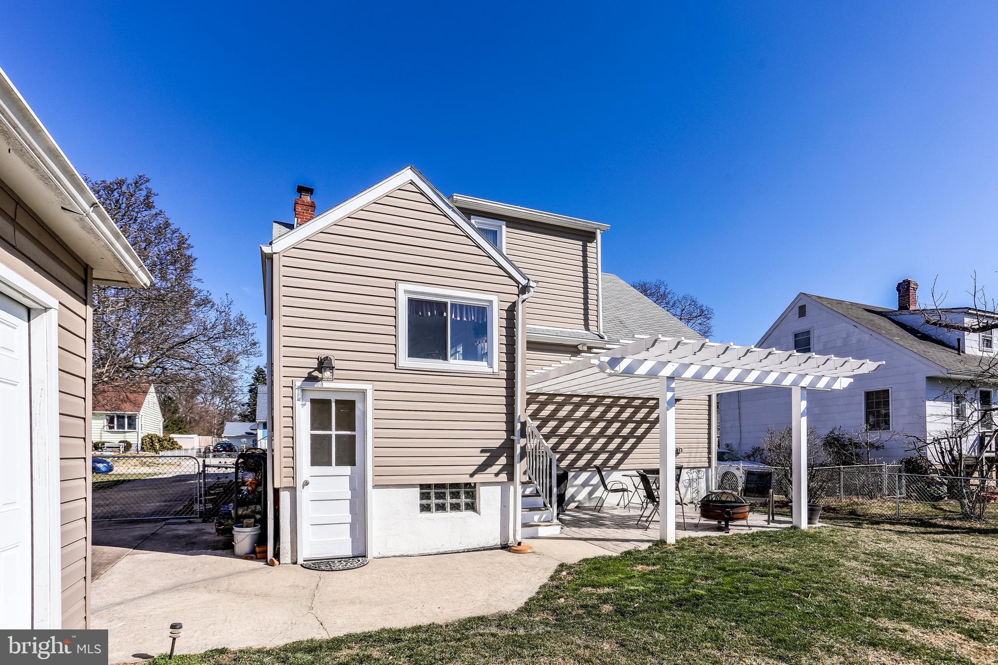 1809 Briarcliff Road Baltimore, MD 21234 - Photo 32 of 33 a front view of a house with a yard