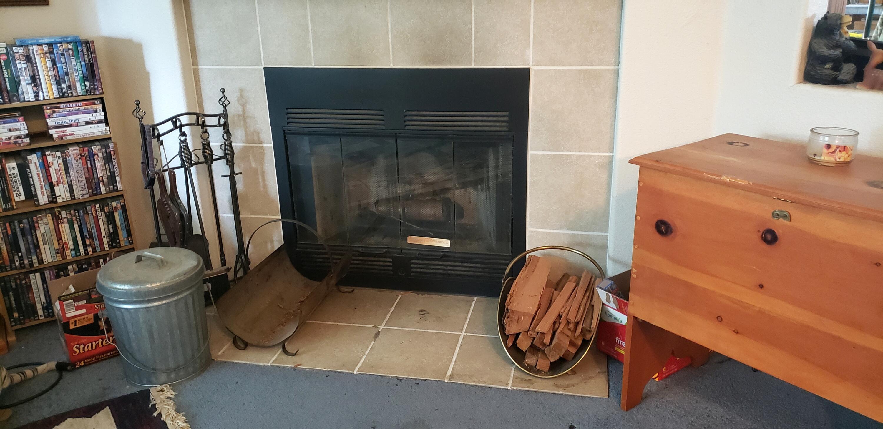 5565 Holland Loop Road Cave Junction, OR 97523 - Photo 7 of 19 Formal living room has wood burning fireplace. Factory installed when built.