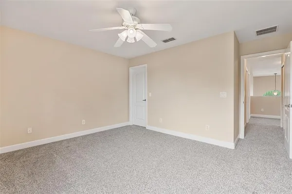 a view of a livingroom with furniture and a window