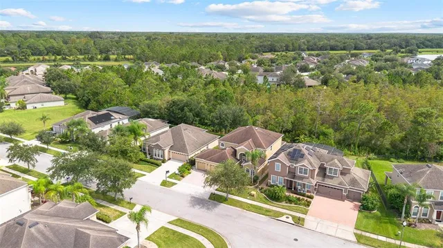 a view of a balcony with a table and chairs