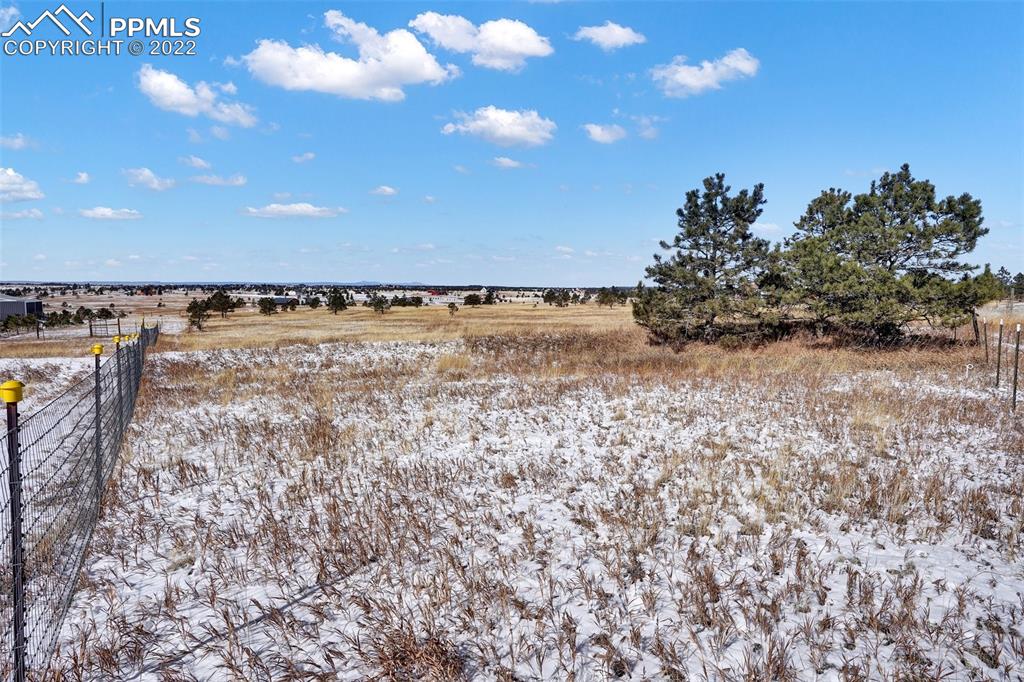 17615 Blacksmith Drive Peyton, CO 80831 - Photo 5 of 15 a view of an outdoor space and a yard