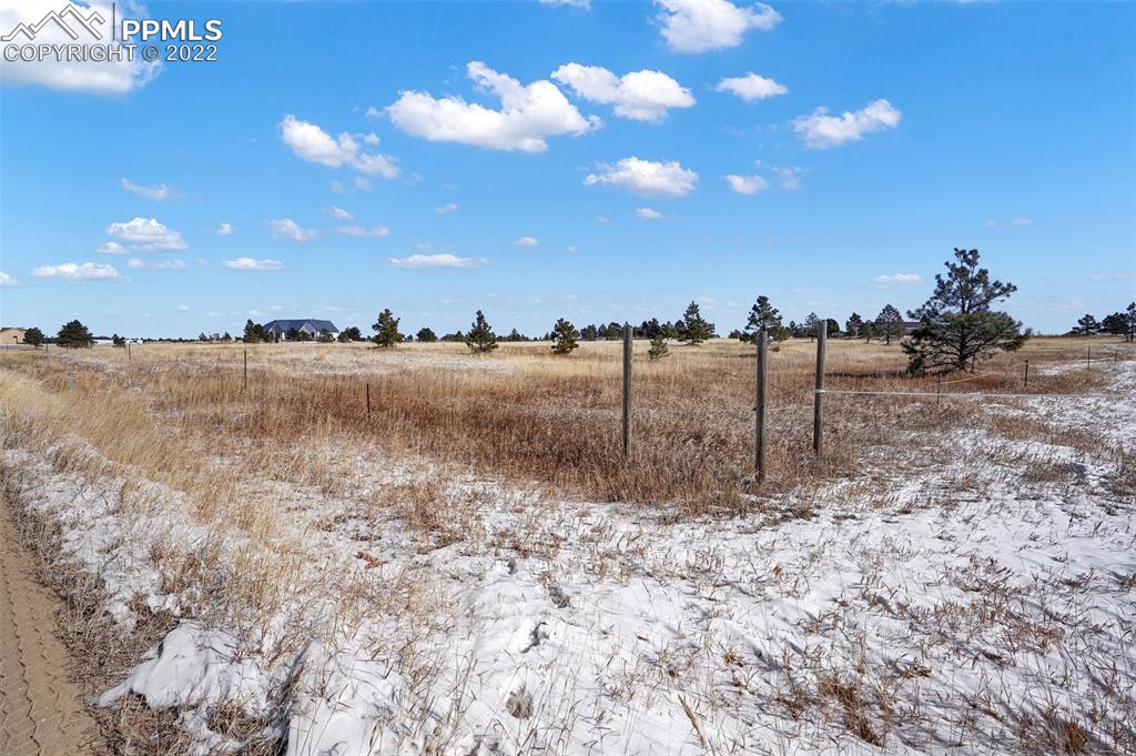 17615 Blacksmith Drive Peyton, CO 80831 - Photo 7 of 15 a view of a lake with a beach