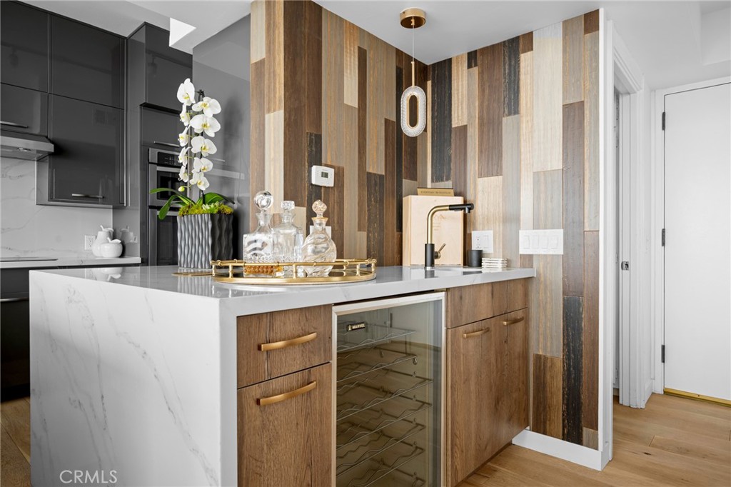 222 Monterey Road, Unit 1603 Glendale, CA 91206 - Photo 18 of 65 a bathroom with a double vanity sink and a mirror