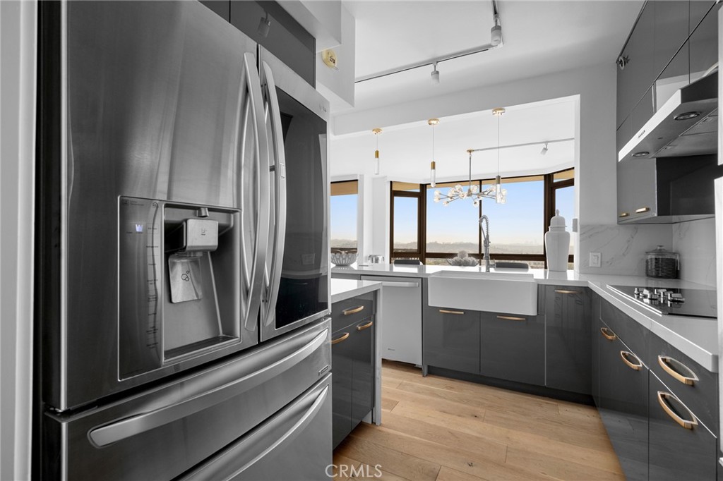 222 Monterey Road, Unit 1603 Glendale, CA 91206 - Photo 21 of 65 a kitchen with cabinets and stainless steel appliances