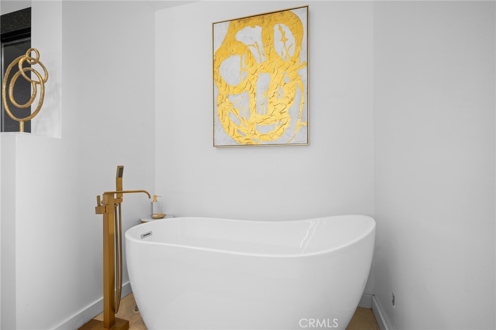 222 Monterey Road, Unit 1603 Glendale, CA 91206 - Photo 28 of 65 a white bath tub sitting next to a window