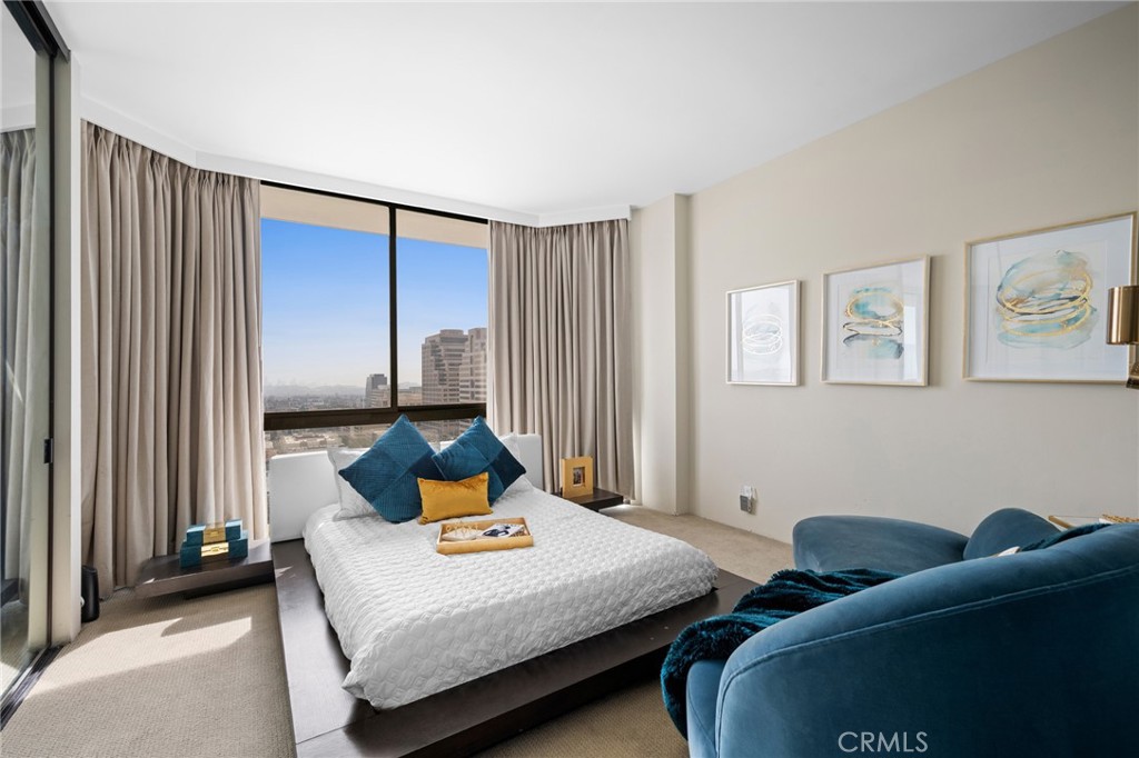 222 Monterey Road, Unit 1603 Glendale, CA 91206 - Photo 29 of 65 a bedroom with bed and a window