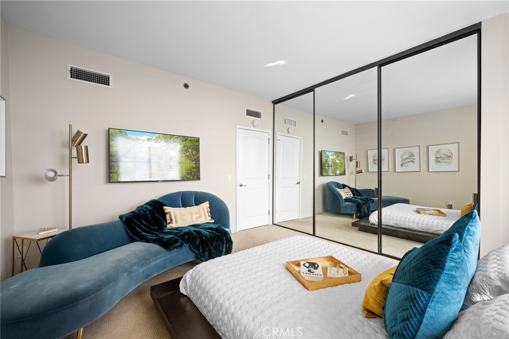 222 Monterey Road, Unit 1603 Glendale, CA 91206 - Photo 30 of 65 a living room with furniture and a table