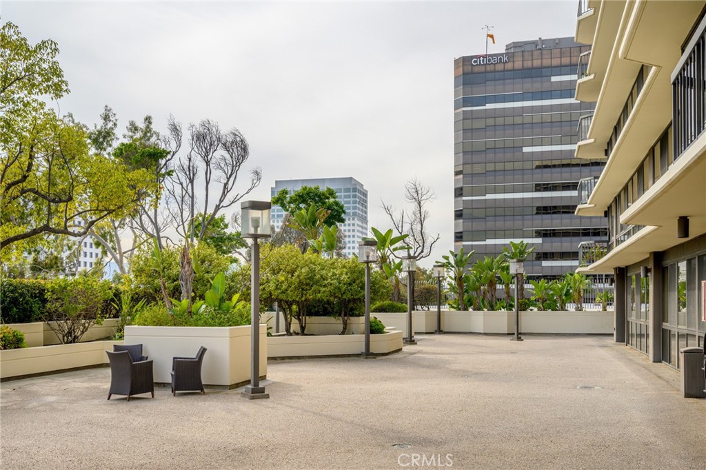 222 Monterey Road, Unit 1603 Glendale, CA 91206 - Photo 41 of 65 a view of a patio with couches and potted plants