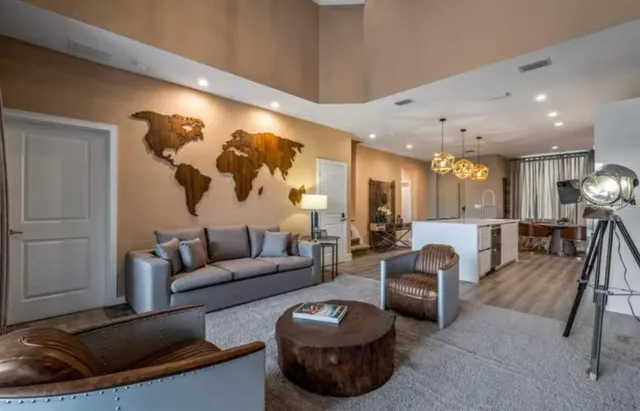 a living room with furniture and a rug