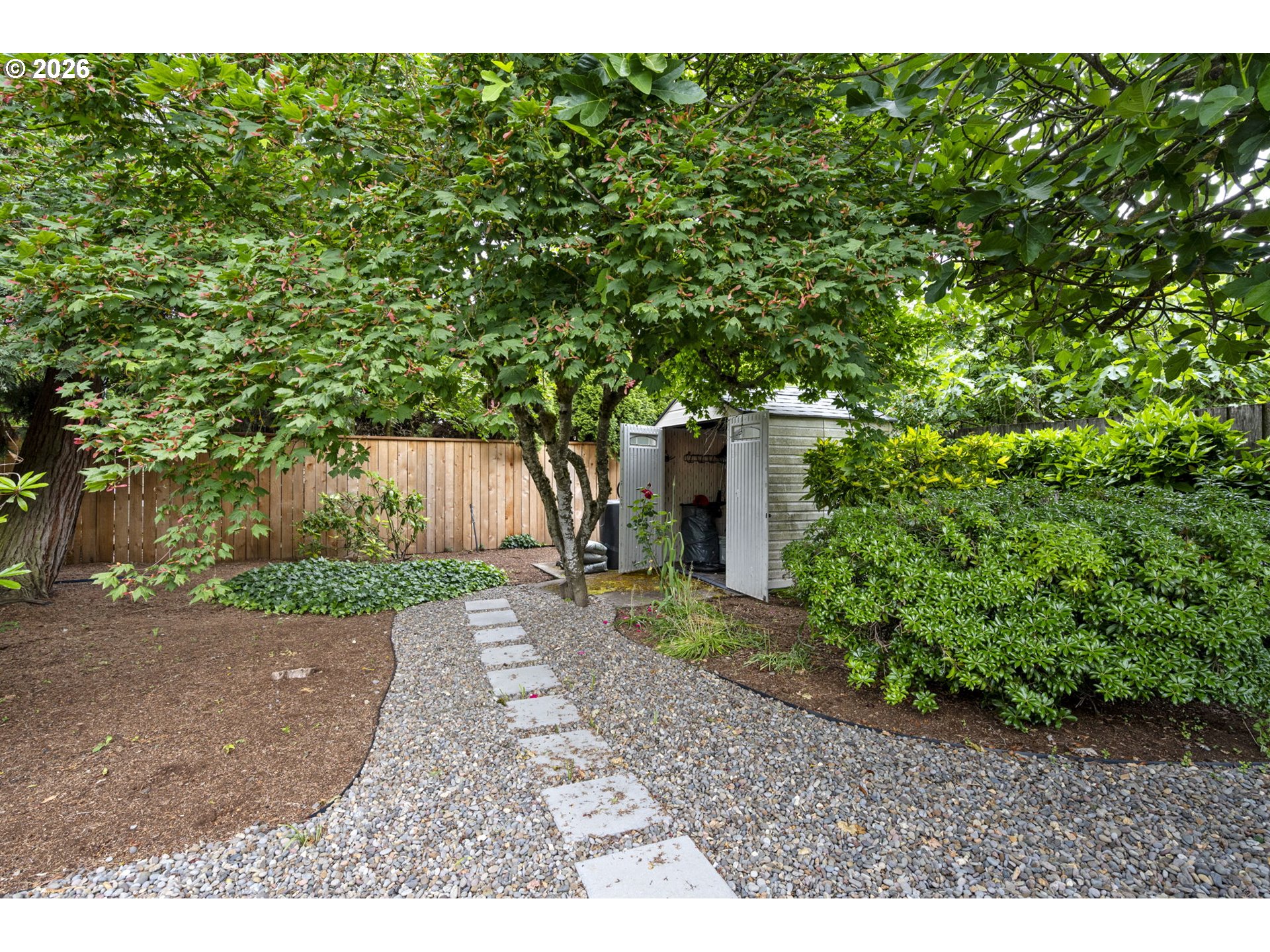 2936 Game Farm Road Springfield, OR 97477 - Photo 24 of 25 a backyard of a house with lots of green space