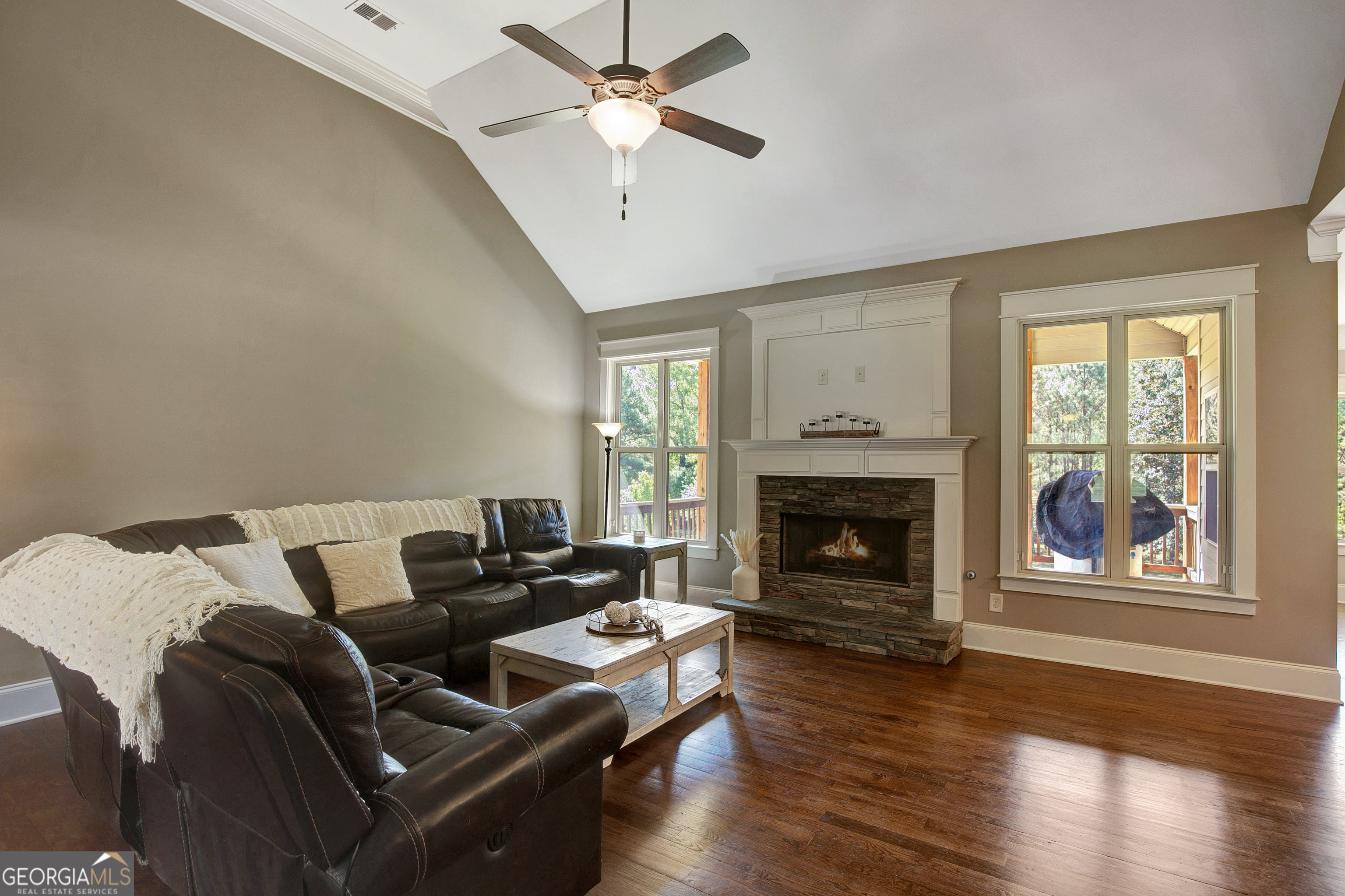 137 Kenmare Row Tyrone, GA 30290 - Photo 66 of 91 a living room with furniture and a fireplace