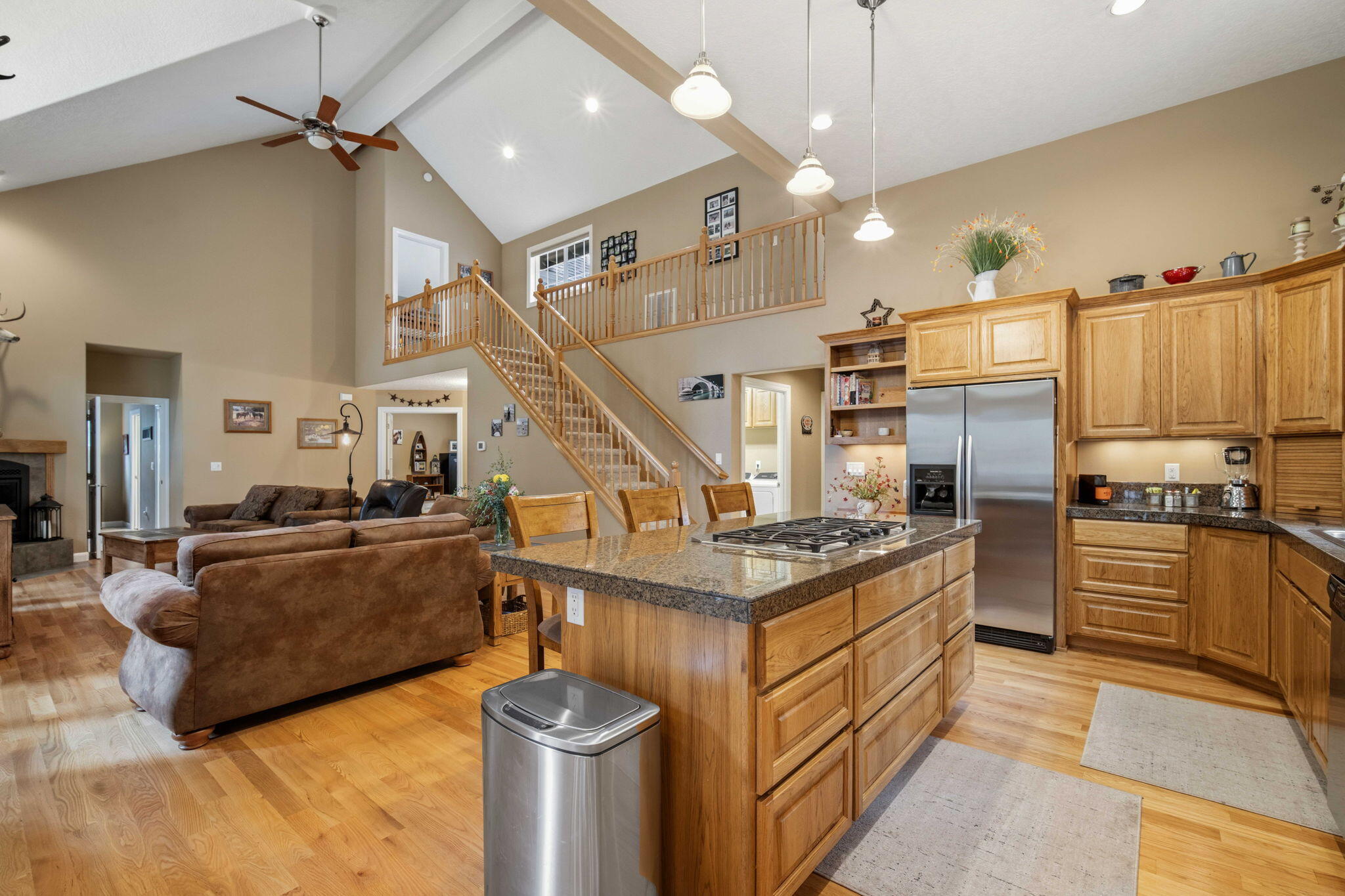 14234 Whitewater Loop La Pine, OR 97739 - Photo 12 of 62 Vaulted ceilings with can lights and a ceiling fan