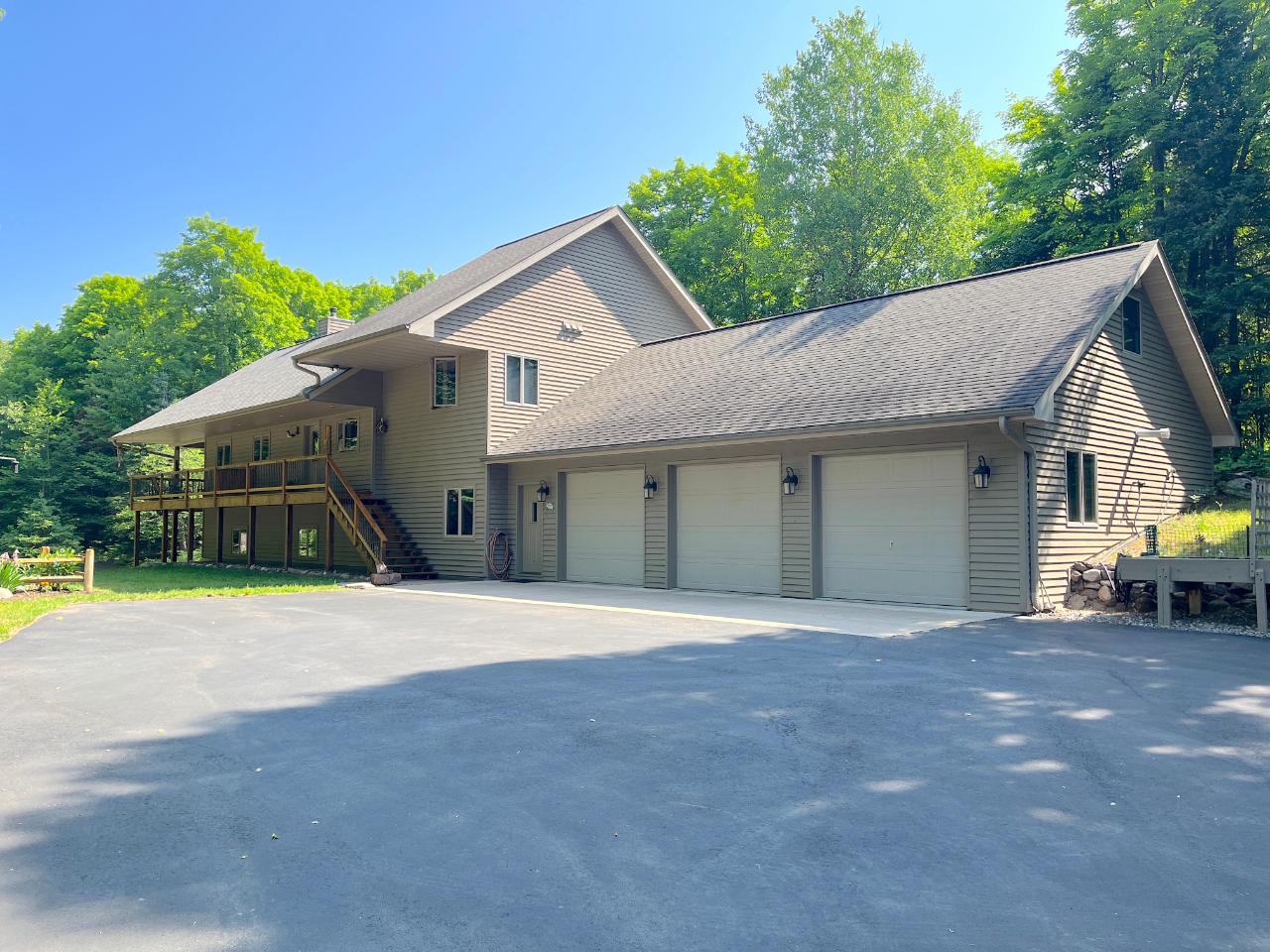 7630 Frontier Road Presque Isle, WI 54557 - Photo 1 of 44 Gallery Image 1