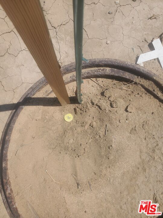 7797 Quartz Road Mojave, CA 93501 - Photo 22 of 23 a view of wooden floor