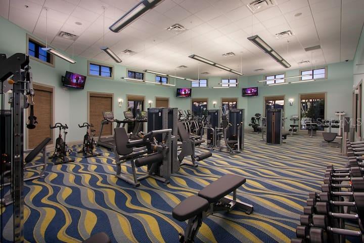 9020 Azalea Sands Lane Davenport, FL 33896 - Photo 7 of 16 a view of a room with gym equipment