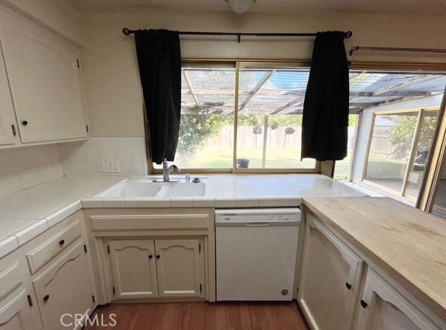 3056 Bedford Drive Merced, CA 95340 - Photo 7 of 19 a view of a kitchen with a sink and a window