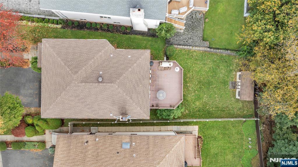 468 Morse Avenue Ridgefield, NJ 07657 - Photo 48 of 48 an aerial view of a house with a garden and a yard