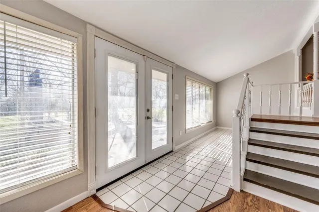 a view of front door with stairs