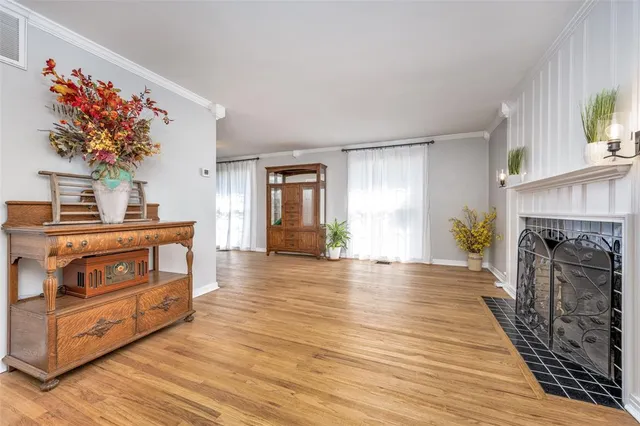 a view of a livingroom with wooden floor