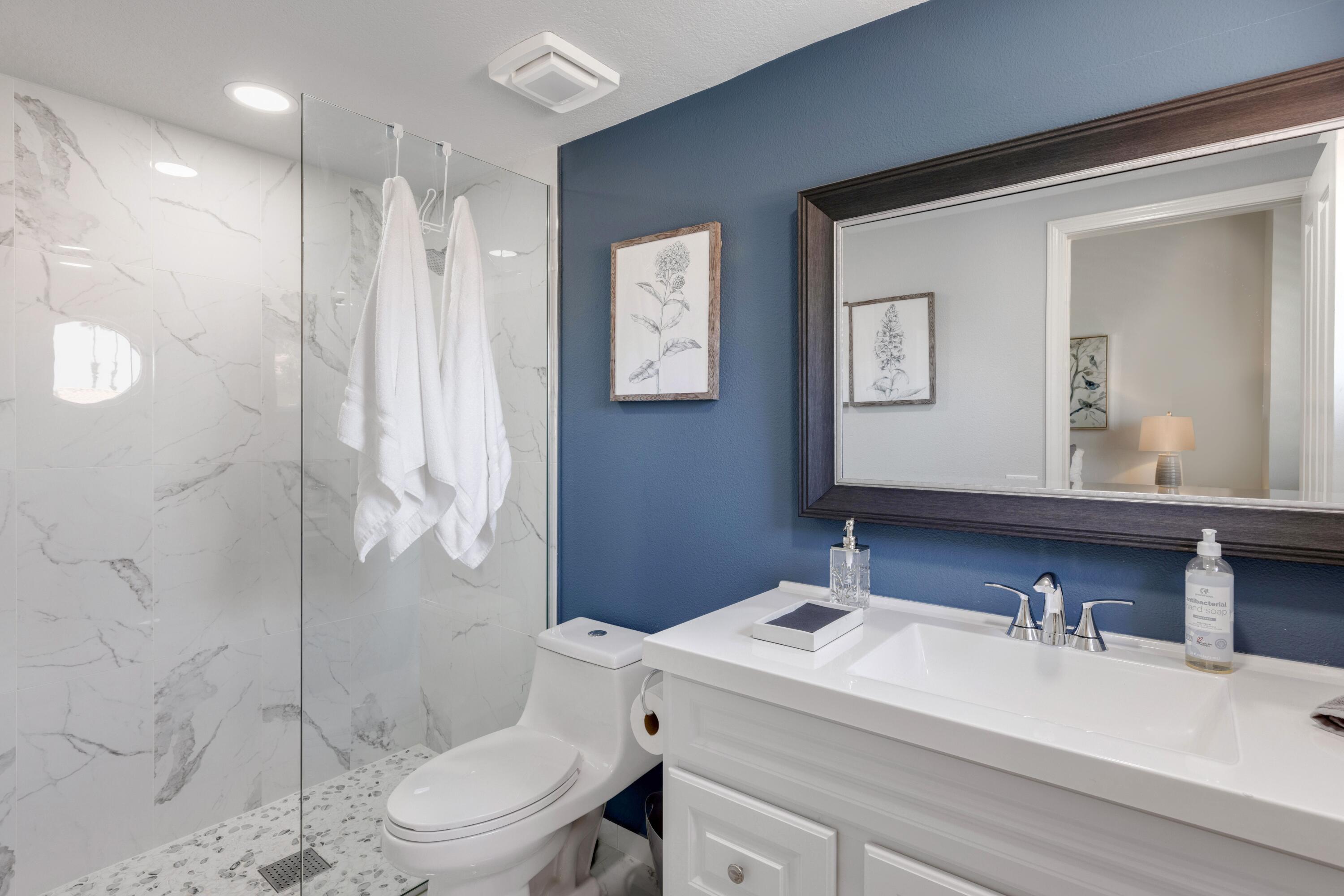 351 Augusta Drive Palm Desert, CA 92211 - Photo 18 of 26 a bathroom with a sink a toilet and shower